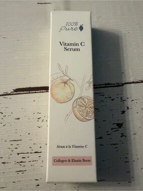 100% Pure Vitamin C Serum in cream and peach hues